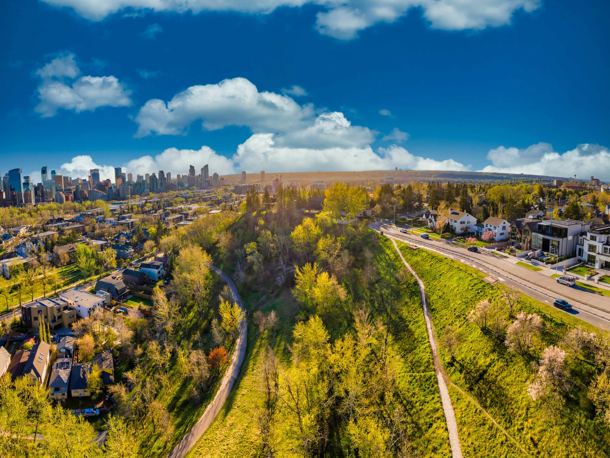 Aerial view along McHugh Bluff toward downtown Calgary
