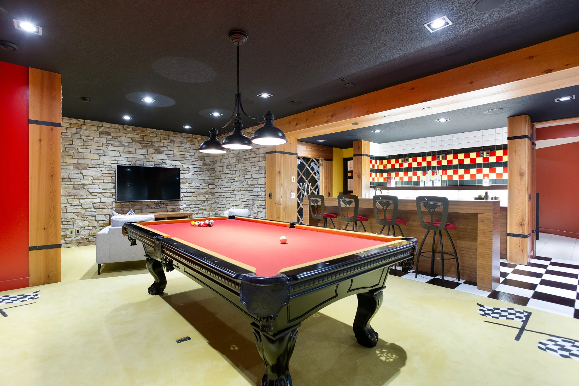 Recreation room with pool table and wet bar