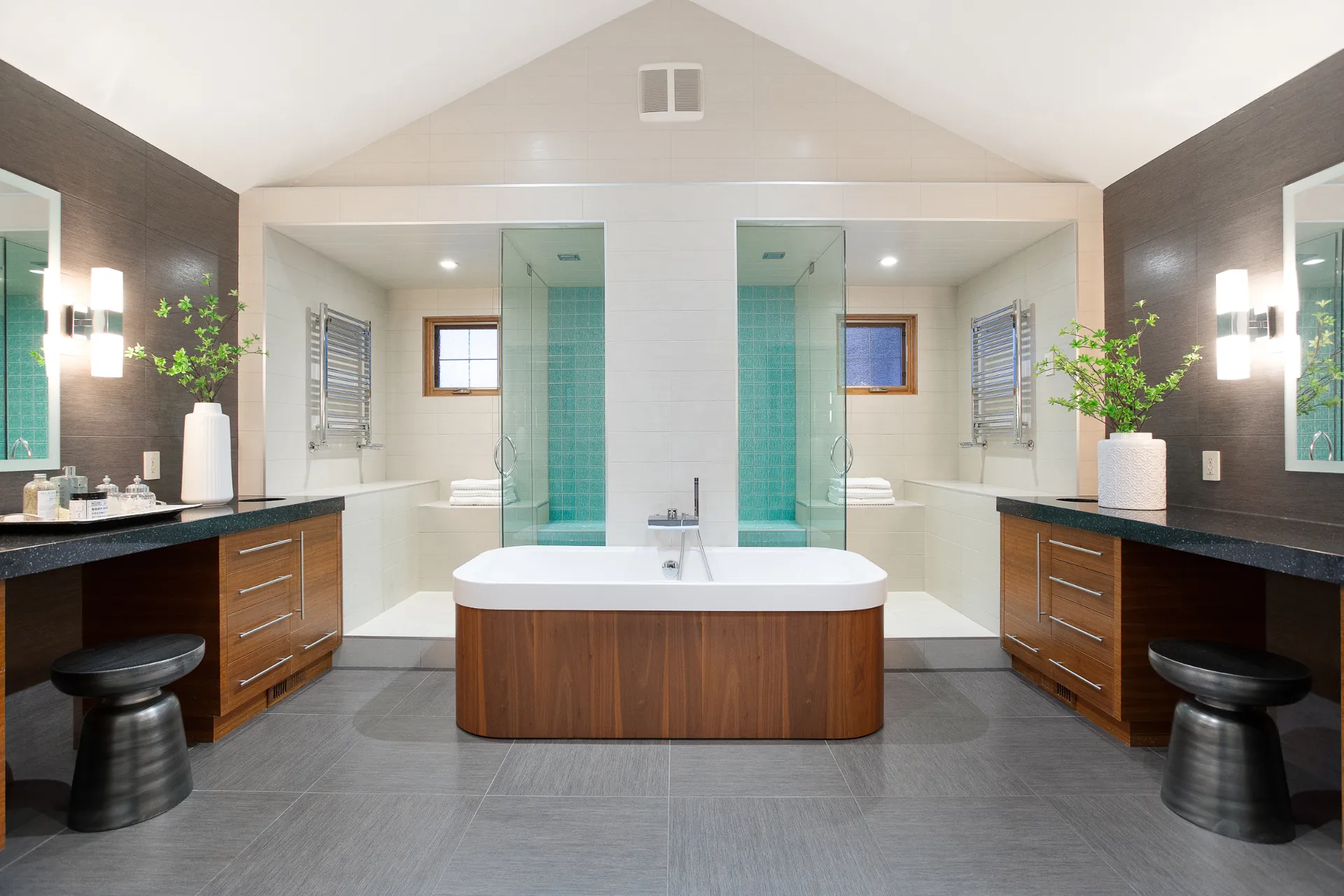 Ensuite with freestanding tub between two vanities